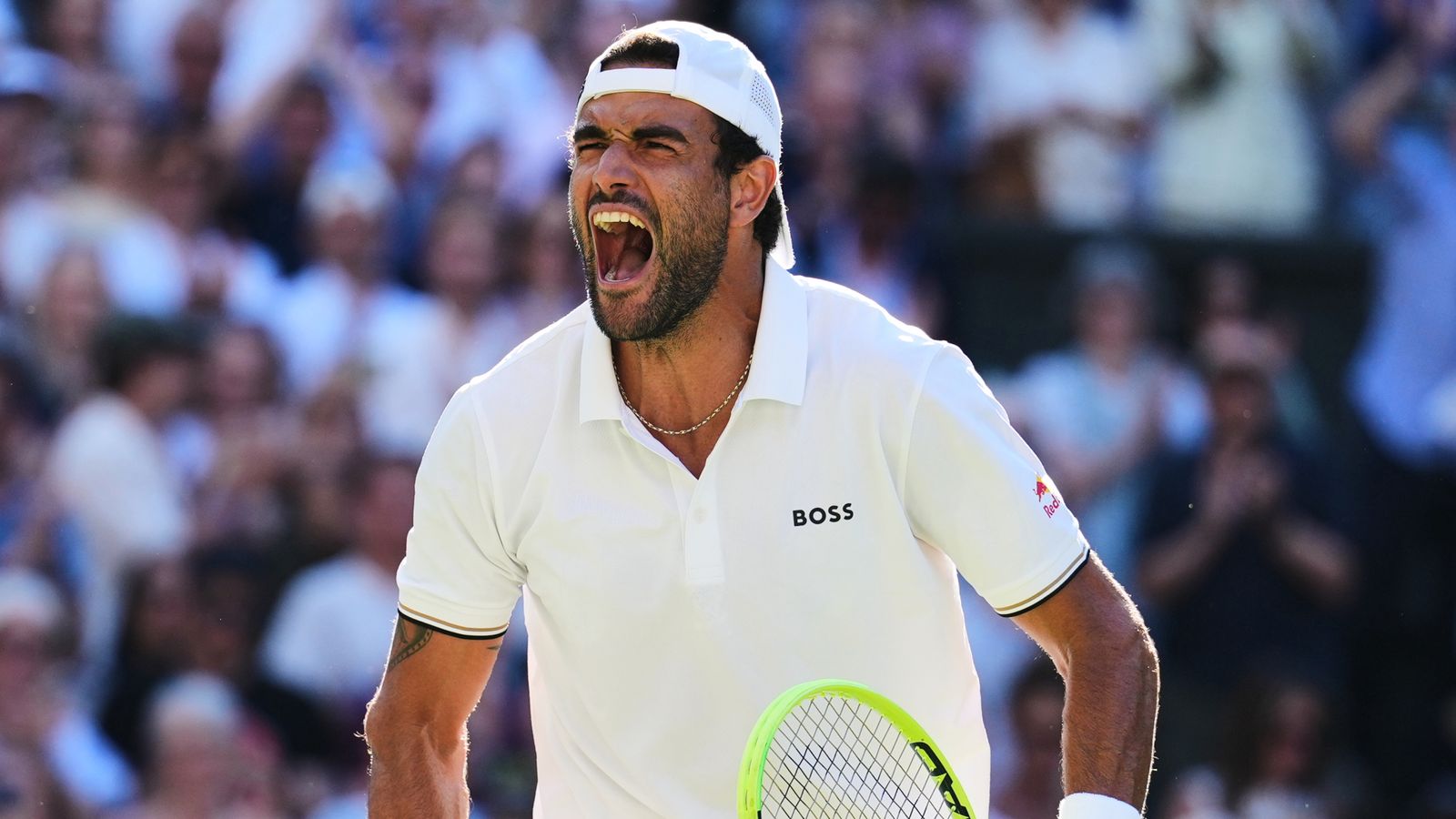 Matteo Berrettini of Italy celebrates winning the second round men's singles match against Arthur Fils of France at the Wimbledon Tennis Cha