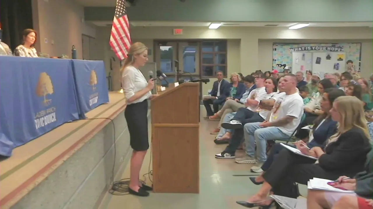 Hundreds of Ladera Ranch residents gathered at a community meeting on July 21, 2026, demanding answers and an investigation into the cause of a string of child cancer diagnoses. (KTLA)
