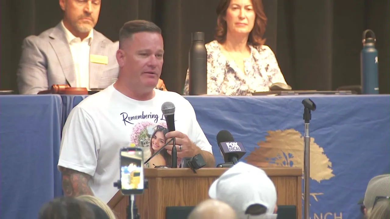 Brian Dalton, who lost his daughter, Lily Dalton to a rare form of cancer, speaks at the Ladera Ranch community meeting on July 21, 2026. (KTLA)