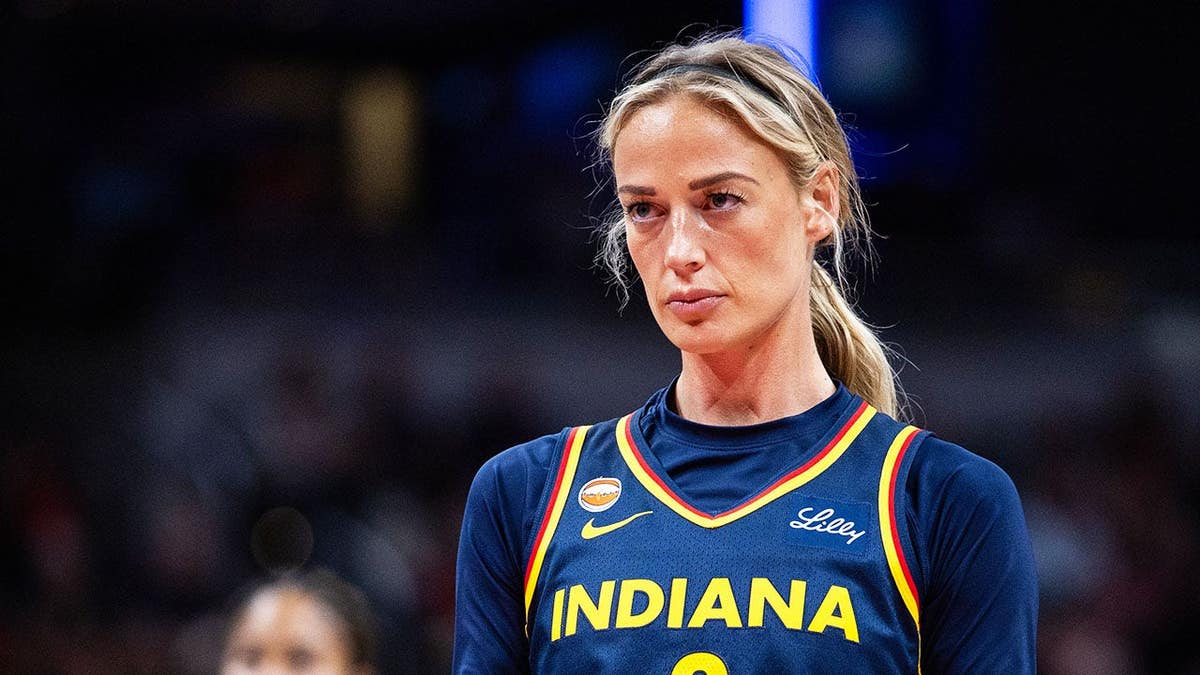 Indiana Fever guard Sophie Cunningham dribbling basketball during game at Gainbridge Fieldhouse