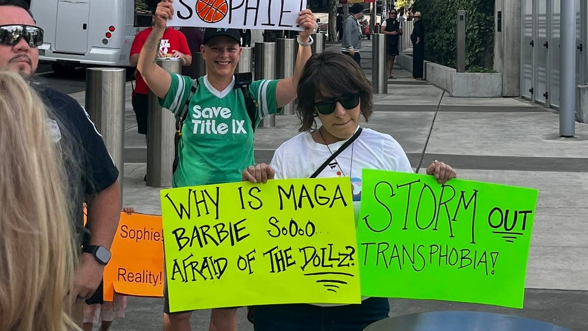 A Sophie Cunningham critic counter-protests at a rally in Seattle.