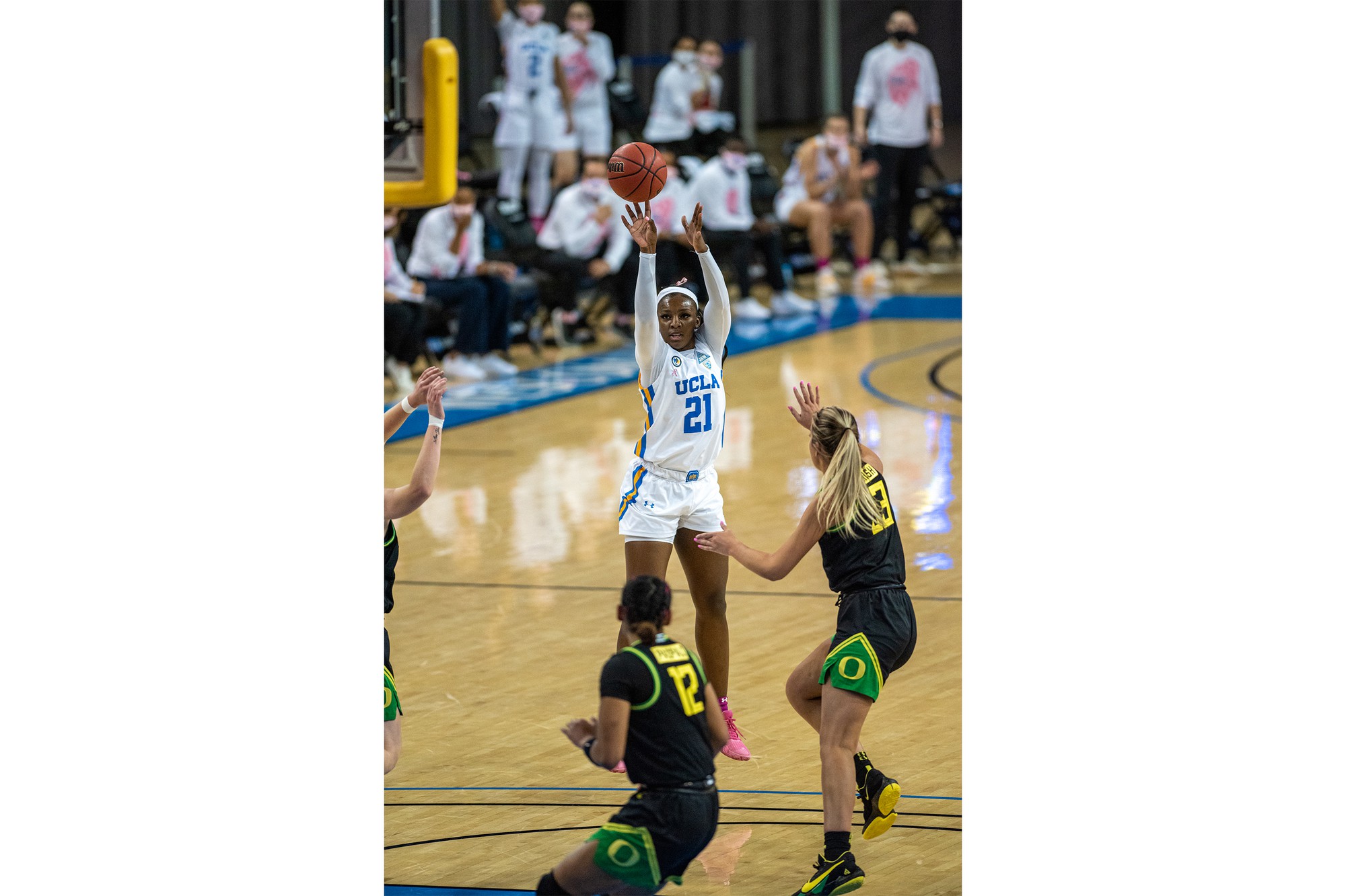 Former Bruin forward Michaela Onyenwere shoots the ball. Onyenwere returned to the Bruins to coach in the 2025-26 season and plays for the Washington Mystics in the WNBA. (Daily Bruin file photo)