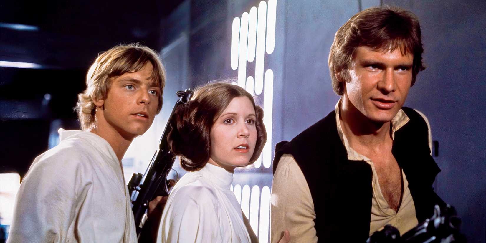 Luke, Leia, and Han Solo stand in a corridor calmly in the midst of escaping in Star Wars: A New Hope