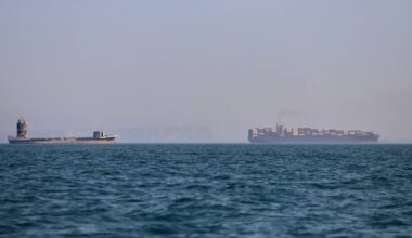 A container ship, right, and a cargo vessel are seen in the Strait of Hormuz off Bandar Abbas, Iran, Wednesday, June 17, 2026. (Amirhosein Khorgooi/ISNA via AP, File)