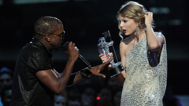 NEW YORK - SEPTEMBER 13: Kayne West (L) jumps onstage as Taylor Swift accepts her award for the