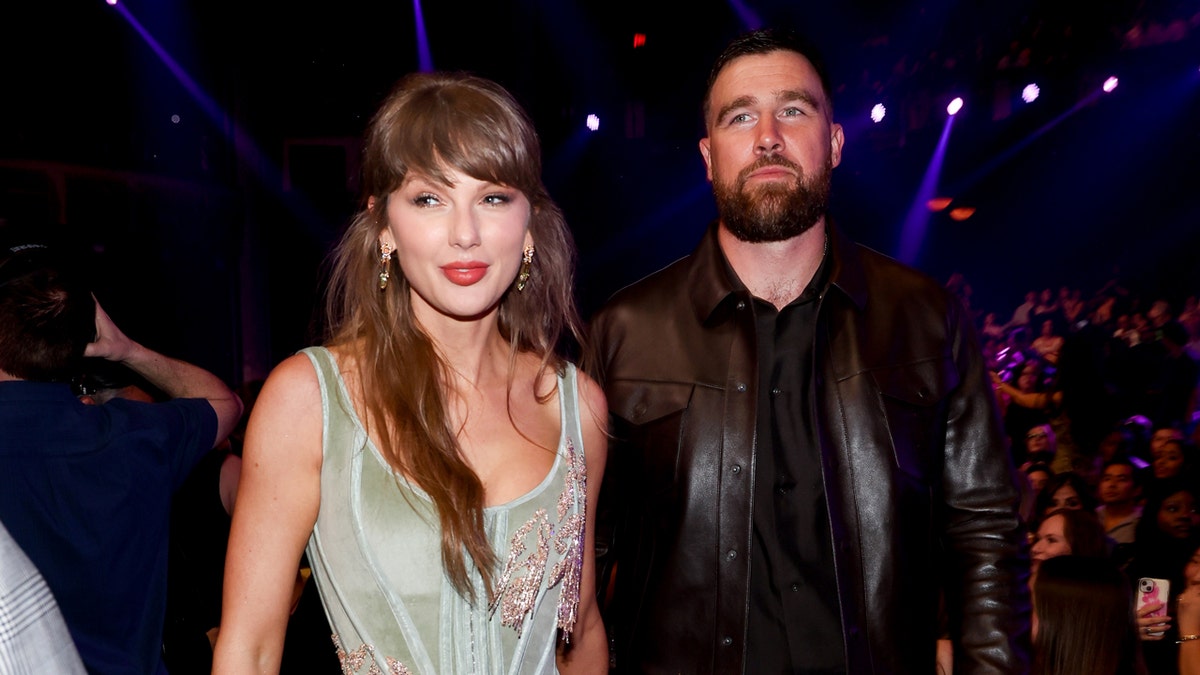 Taylor Swift and Travis Kelce at an awards show