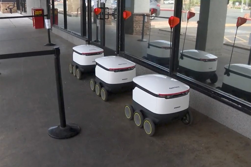 Three Starship Technologies autonomous food delivery robots.