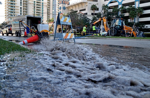 A crew responds to a water pipe break near 100 South Birch Road in Fort Lauderdale in February 2020. After a slew of pipe breaks, the city is now under consent order by the state to map its grid of water pipes and replace the old ones. (Susan Stocker/South Florida Sun-Sentinel) 