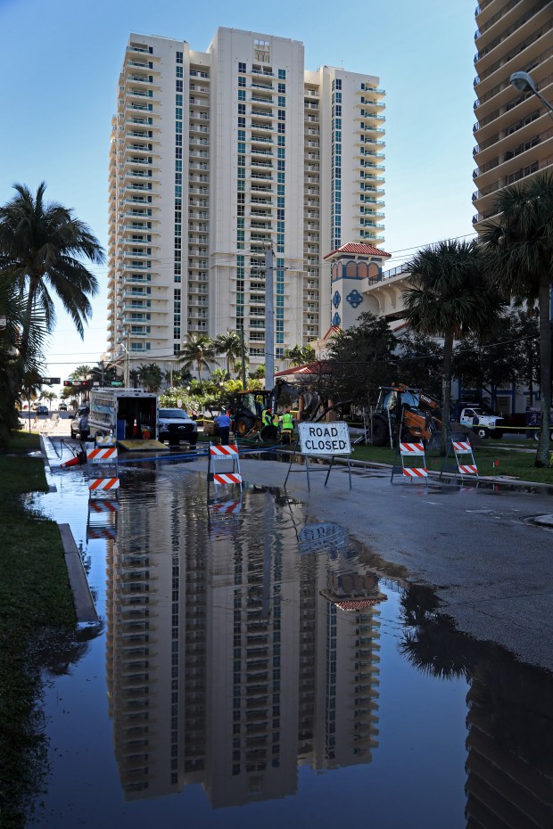 Water floods a street near Fort Lauderdale beach after a pipe break along 100 South Birch Road in February 2020. (Susan Stocker/South Florida Sun Sentinel)