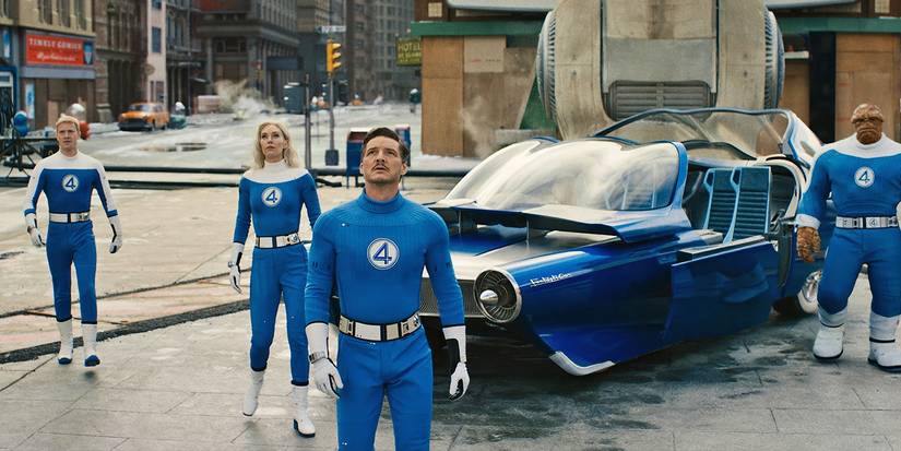 The team looking up at something in the street - a fight about to happen - 'Fantastic Four: First Steps.'