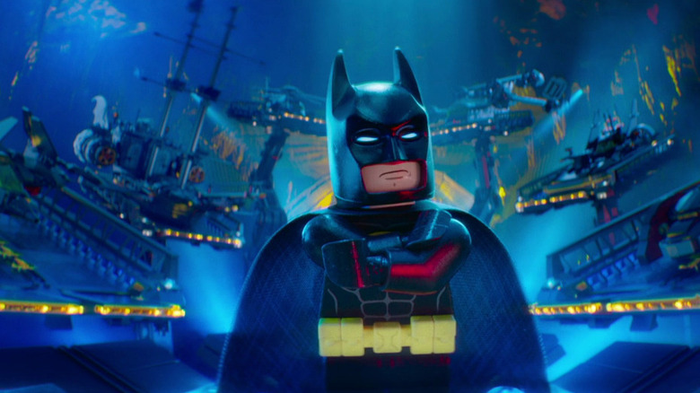 Batman surrounded by all his bat-vehicles in The Lego Batman Movie