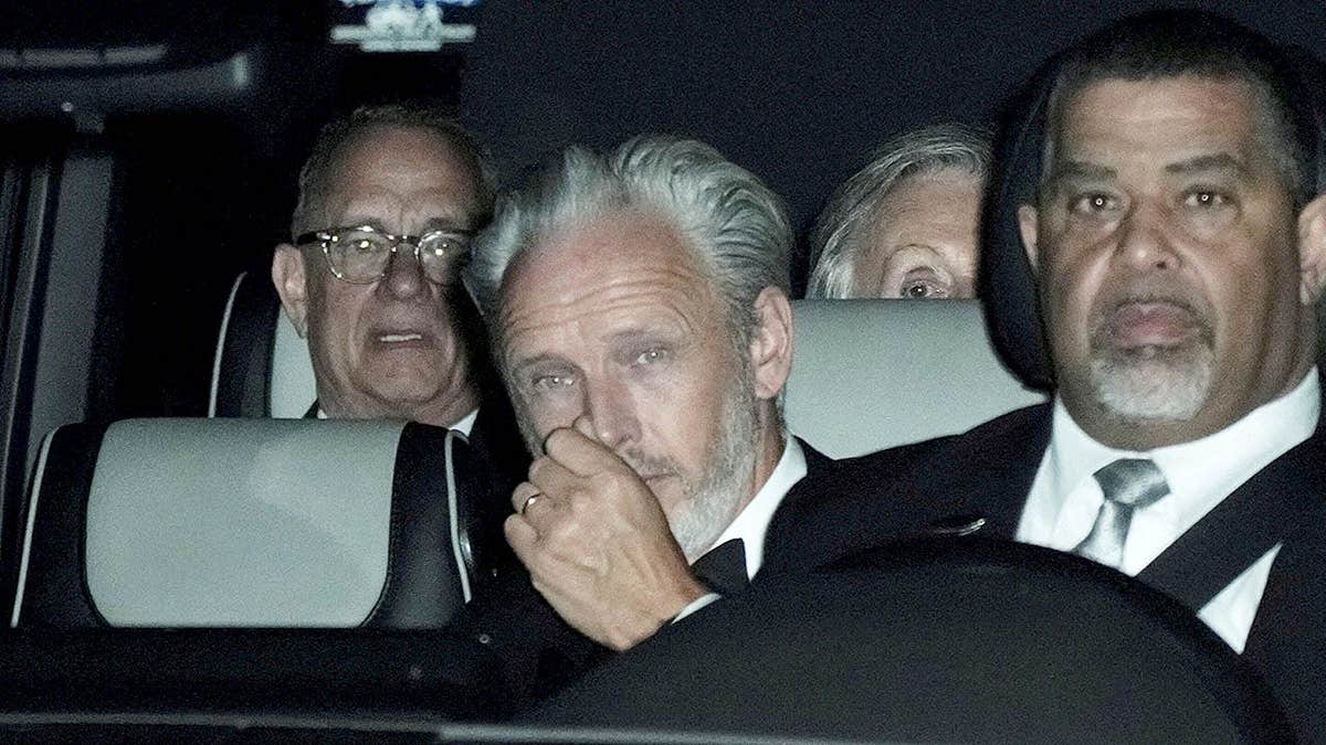 Tom Hanks and Paul McCartney leave Taylor Swift and Travis Kelce's wedding in back of car