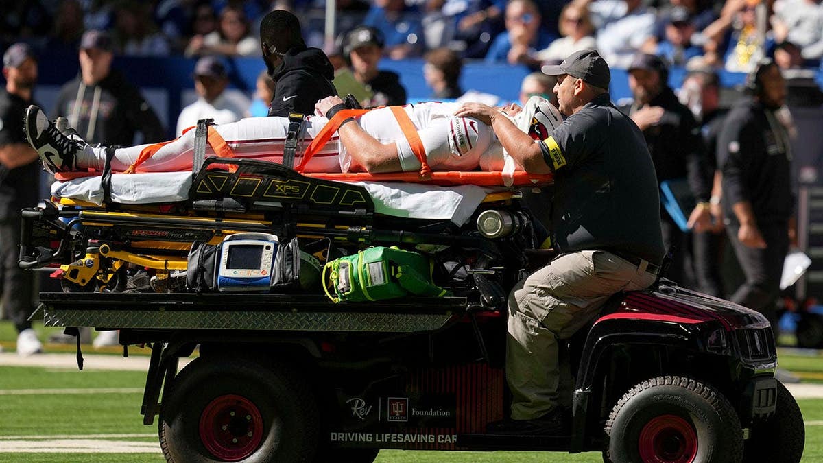 Travis Vokolek leaves the field after an injury during a game.