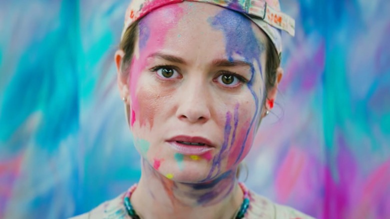 Kit, covered in paint, in Unicorn Store