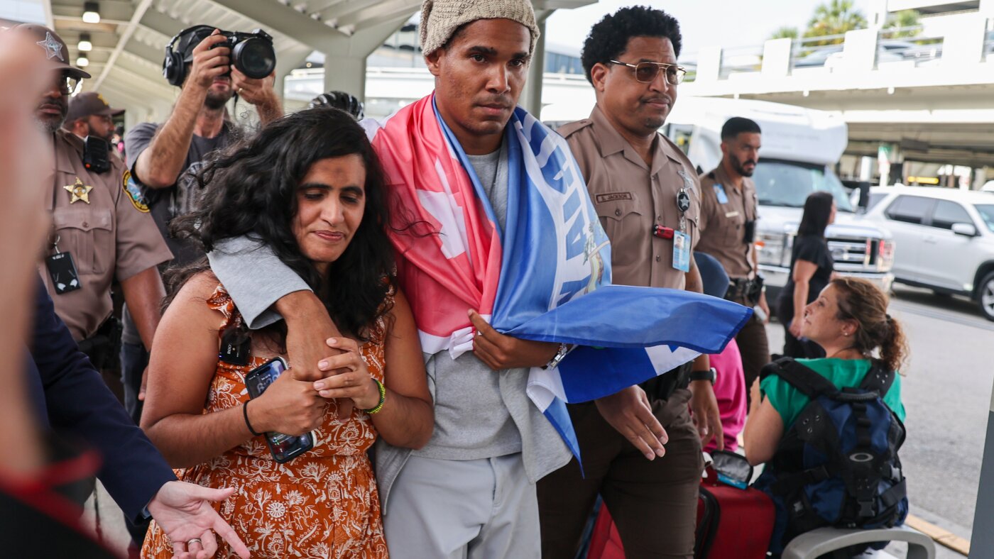 Cuban artist and dissident exiled from country after 5 years in prison arrives in US : NPR