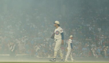 Cubs fans sing `Take Me Home, Country Roads' during fog delay at Wrigley Field