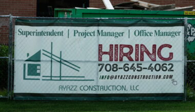 U.S. filings for jobless aid fall to 215,000 as layoffs remain at historically healthy levels