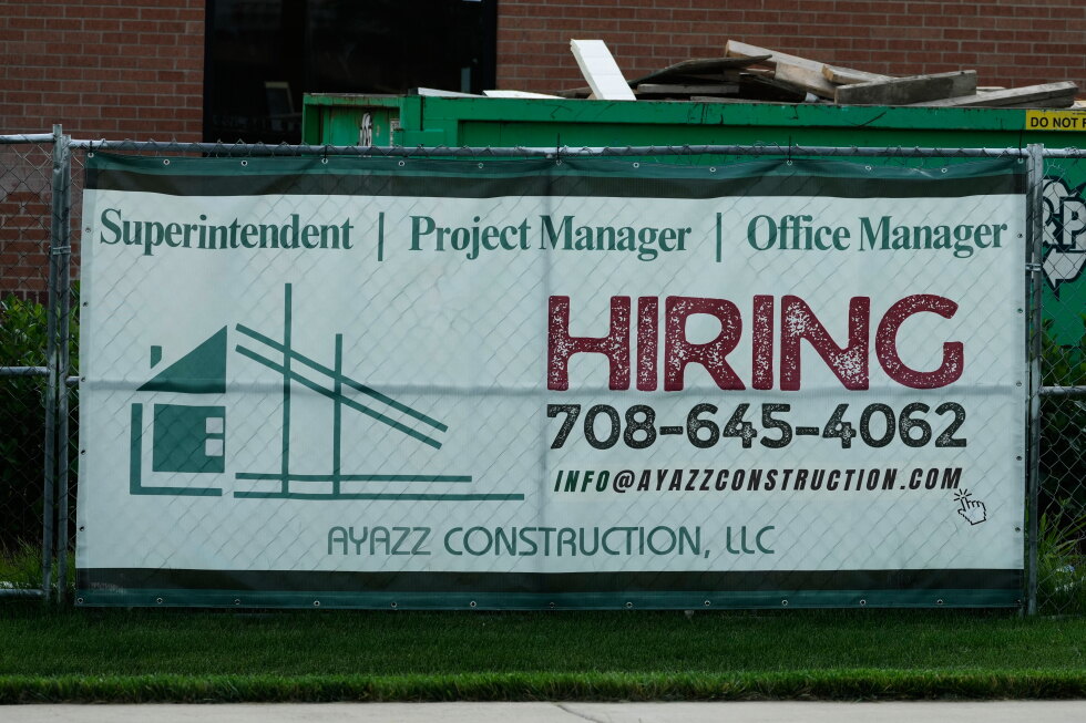 U.S. filings for jobless aid fall to 215,000 as layoffs remain at historically healthy levels