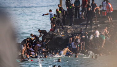 Thousands break through border separating Spain's Ceuta from Morocco
