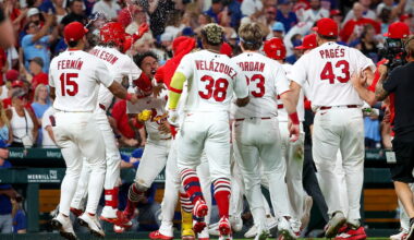 Herrera doubles as Cardinals rally to beat Cubs 3-2 in 10 innings