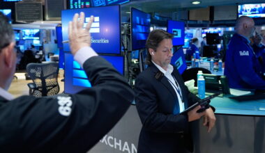 US stocks hold steadier after inflation data, even as IBM plunges