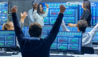 Wall Street analysts celebrating on the trading floor.