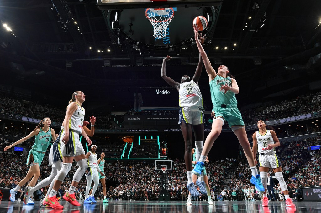 Breanna Stewart #30 of the New York Liberty drives to the basket during the game against the Dallas Wings.