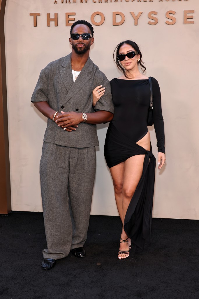 Victor Cruz and Orange Calderón at the New York premiere of "The Odyssey"