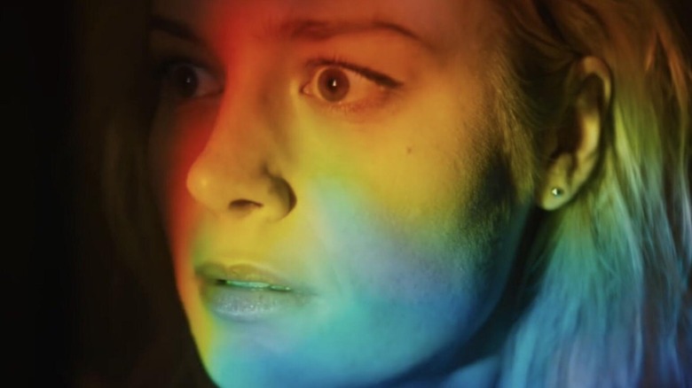 Kit with a rainbow on her face in Unicorn Store