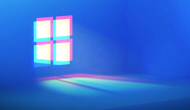 Windows logo blurred on a blue background.