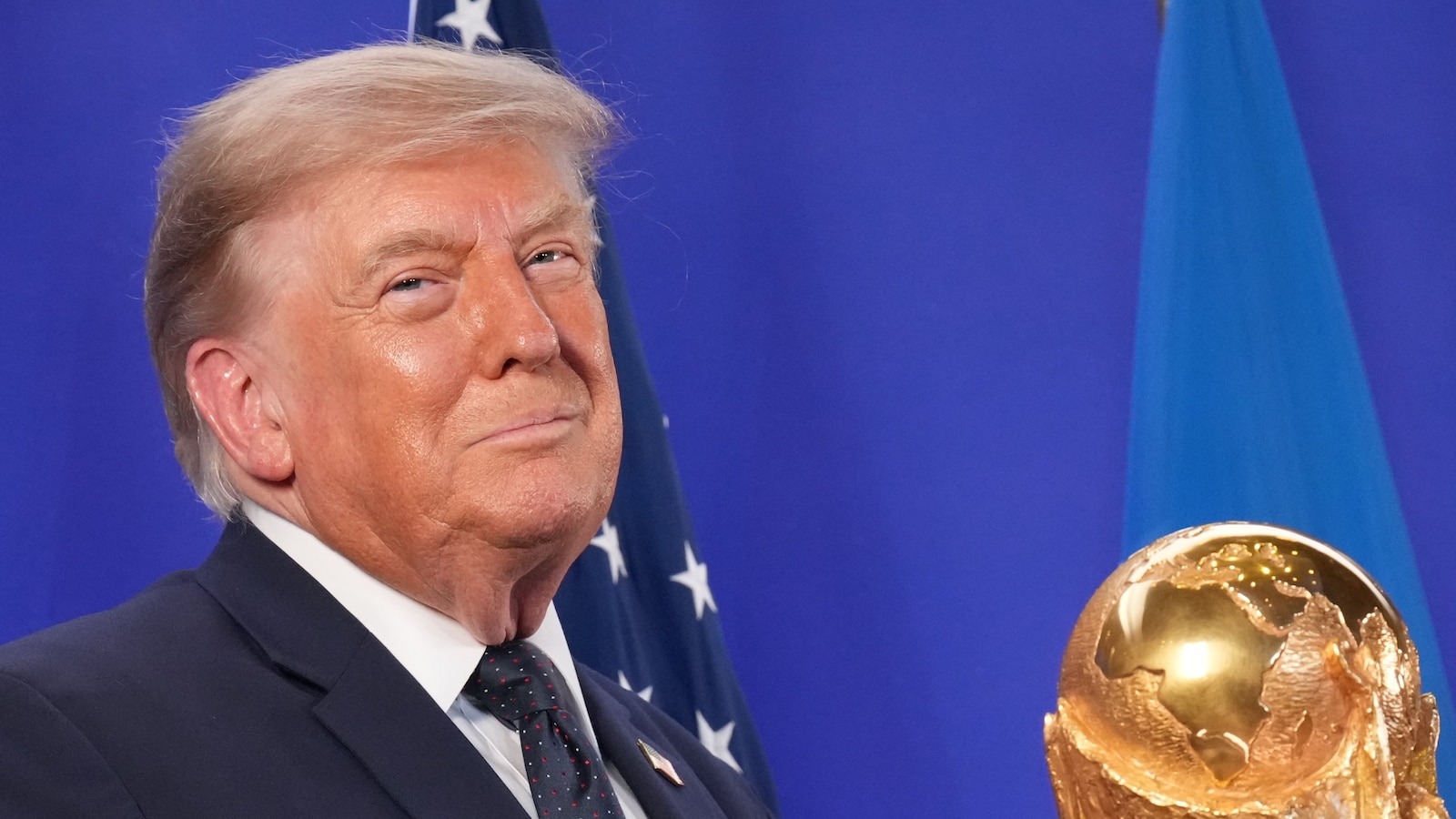 Trump celebrates the World Cup as a US victory as he prepares to present trophy to the winning team