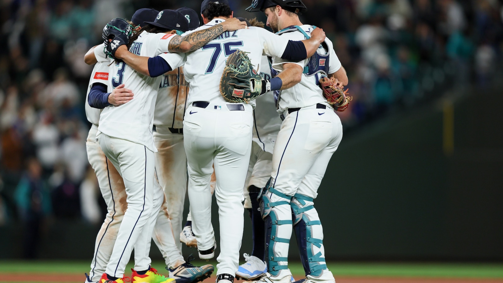 Mariners have big sixth inning to back Woo in an 8-3 victory over the Angels