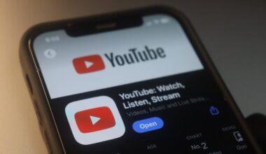 YouTube logo displayed on a smartphone