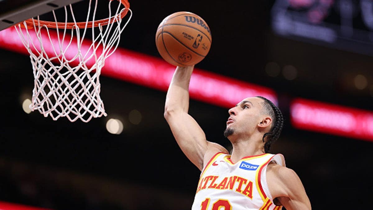 Zaccharie Risacher dunks against the Portland Trail Blazers in Atlanta.
