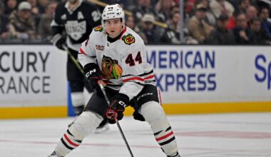 Dec 4, 2025; Los Angeles, California, USA;  Chicago Blackhawks defenseman Wyatt Kaiser (44) handles the puck against the Los Angeles Kings at Crypto.com Arena. Mandatory Credit: Jayne Kamin-Oncea-Imagn Images