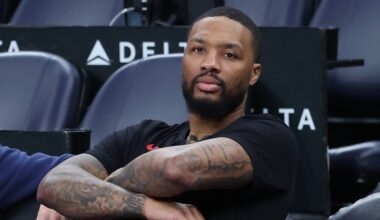 Oct 29, 2025; Salt Lake City, Utah, USA; Portland Trail Blazers guard Damian Lillard (0) watches the team warm up before the game against the Utah Jazz at Delta Center. Mandatory Credit: Rob Gray-Imagn Images