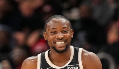 Atlanta Hawks forward Jonathan Kuminga (0) reacts after making a three point shot against the Washington Wizards during the first half at State Farm Arena on Feb 26, 2026.