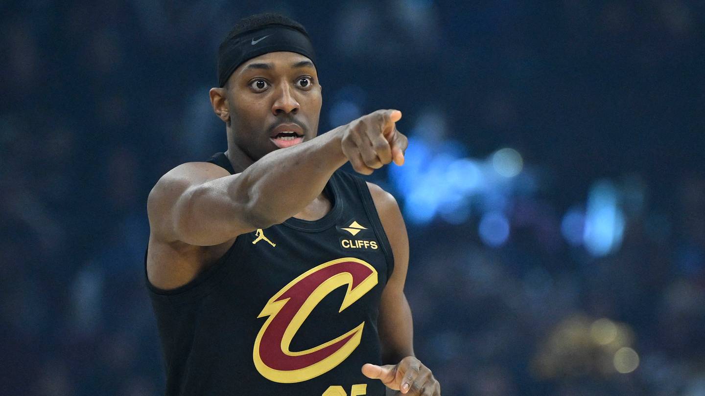 Dec 14, 2025; Cleveland, Ohio, USA; Cleveland Cavaliers forward Nae'Qwan Tomlin (35) reacts in the first quarter against the Charlotte Hornets at Rocket Arena. Mandatory Credit: David Richard-Imagn Images