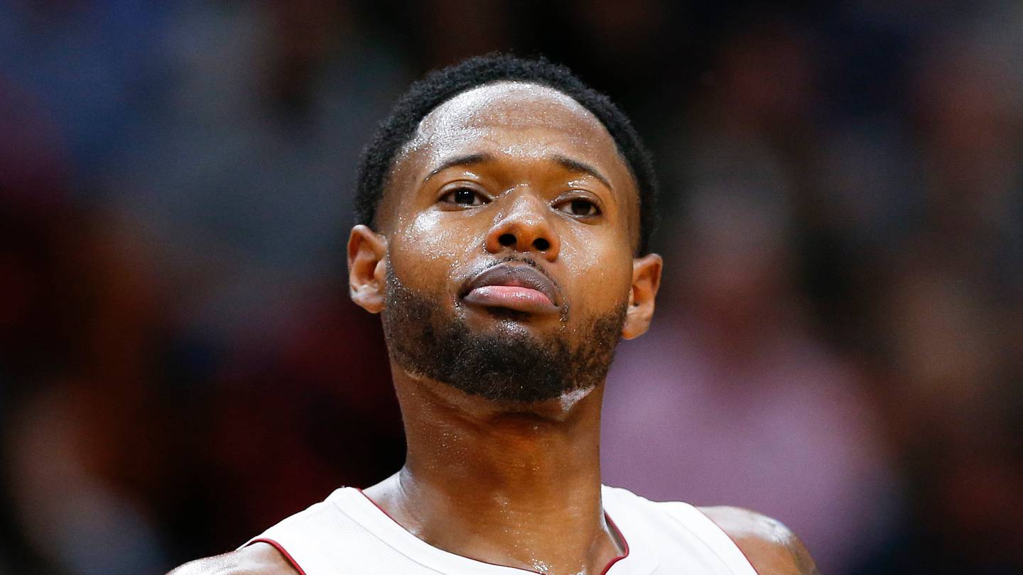 Miami, Florida, USA; Miami Heat forward Haywood Highsmith (24) reacts during the second quarter of the game against the Dallas Mavericks at FTX Arena on Feb 15, 2022.