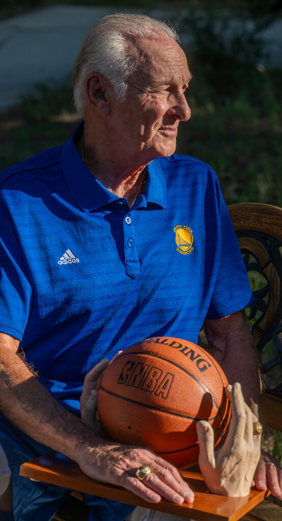 NBA Hall of Famer Rick Barry holds a sculpture he had commissioned of his hands wearing a replica of his NBA Championship ring, which he is wearing in the photo. Barry won an NBA Championship with the Warriors in 1975. He was named the NBA Finals MVP after they swept the Washington Bullets. (Jerilee Bennett, The Gazette)