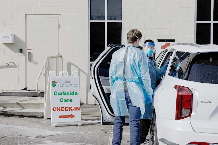 Medical workers assess a patient with symptoms of the measles in a parking lot in Spartanburg, South Carolina, in January. Spartanburg was the site of one of the nation’s biggest outbreaks since last year