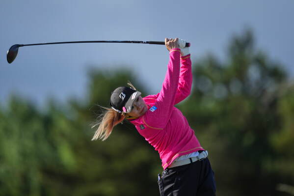 Shiho Kuwaki, of Japan, drives off the 4th tee during the second round of the Women's British Open golf championship in Lytham St Annes, England, Friday, July 31, 2026. (AP Photo/Jon Super)