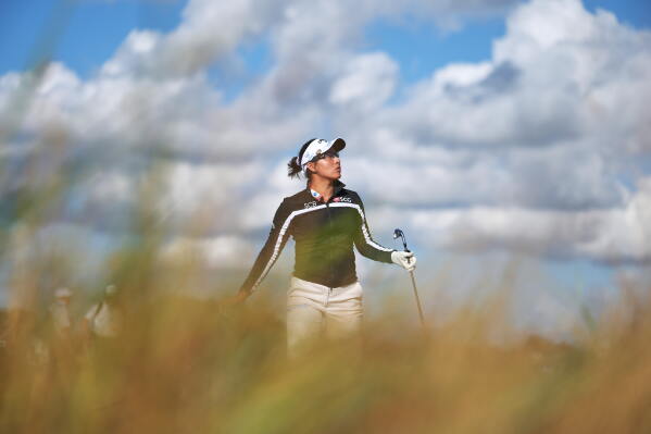 Jeeno Thitikul, of Thailand, walks up the 16th fairway during the first round of the Women's British Open golf championship in Lytham St Annes, England, Thursday, July 30, 2026. (AP Photo/Jon Super)