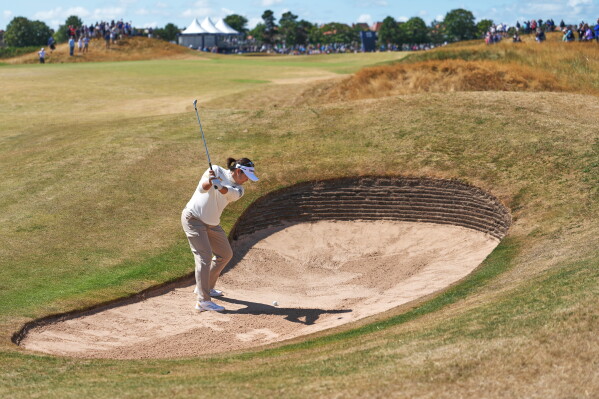 Haeran Ryu, of South Korea, plays a shot out of a bunker on the 15th hole during the first round of the Women's British Open golf championship in Lytham St Annes, England, Thursday, July 30, 2026. (AP Photo/Jon Super)