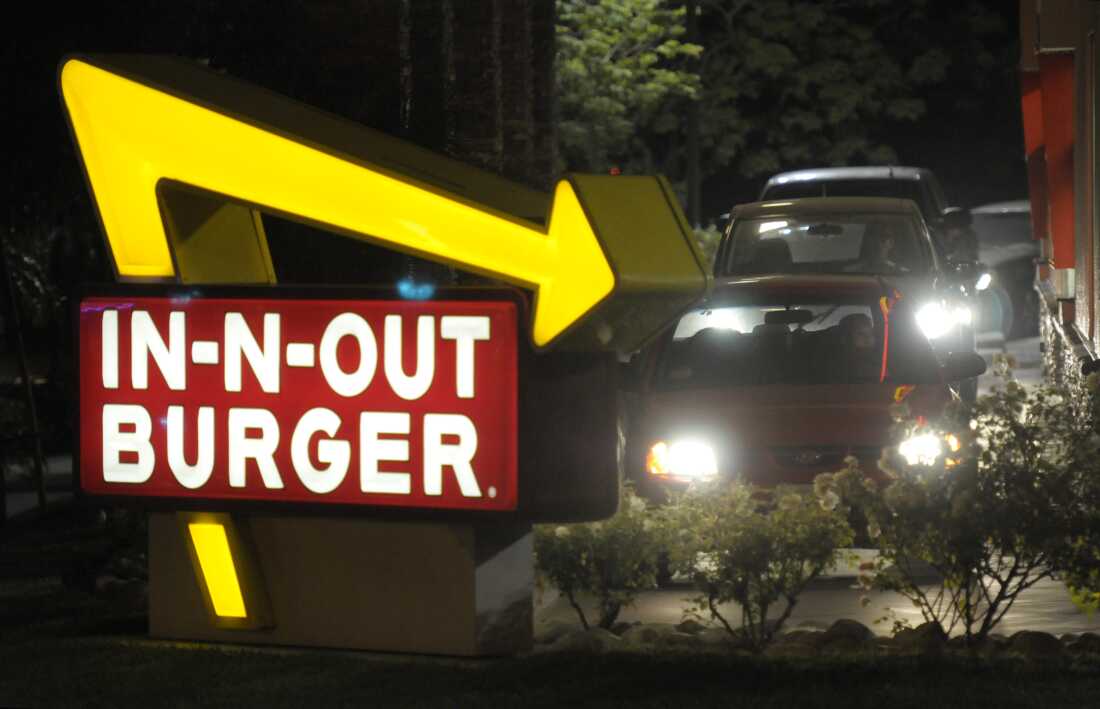 FILE PHOTO: Cars line up in the drive-thru at In-N-Out Burger on Tuesday, June 8, 2010, in Baldwin Park, Calif.