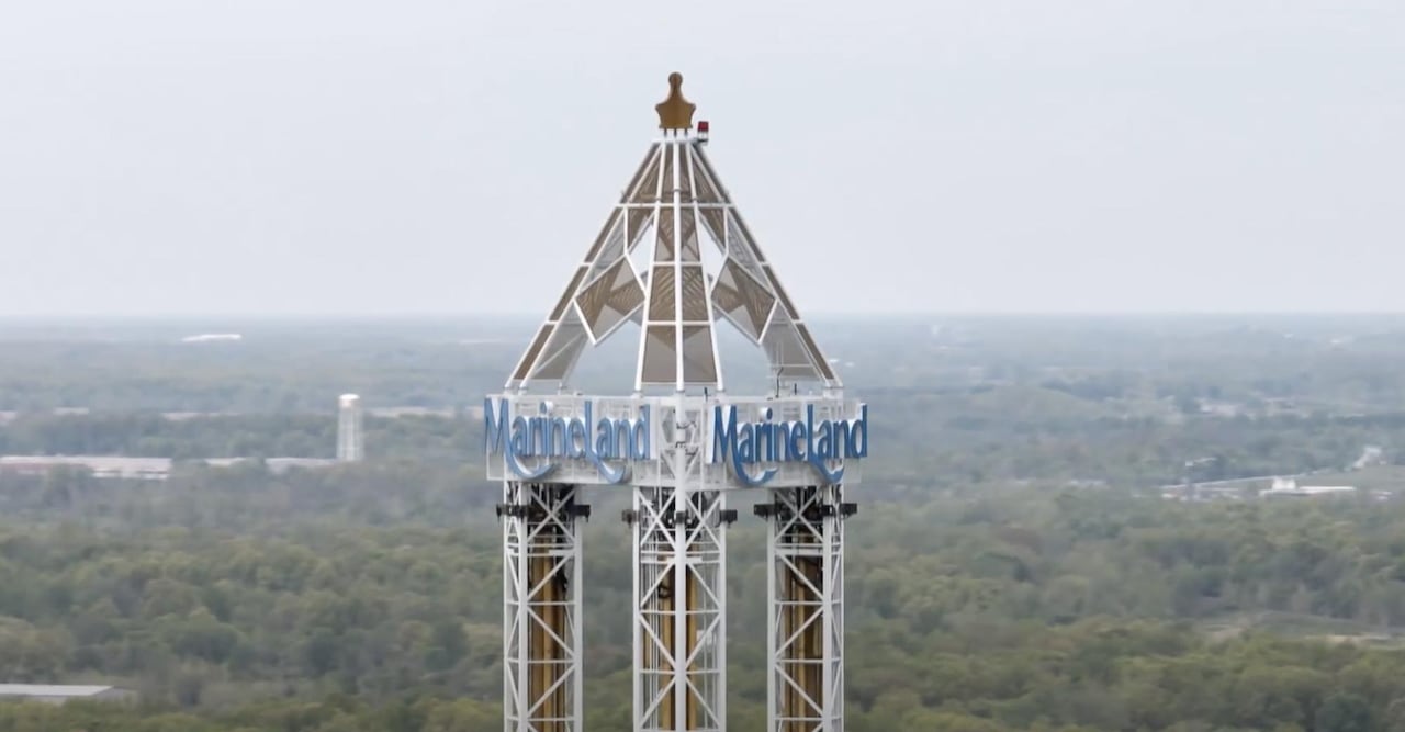 A photo of the tower at Marineland and the sign baring the parks name.