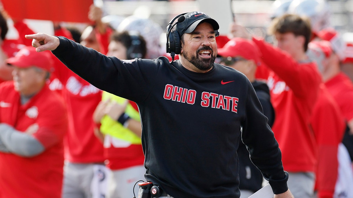 Ryan Day calls plays on the sideline