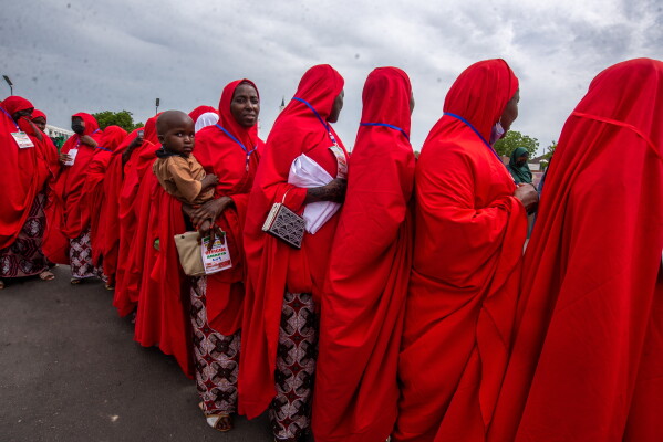 Nigerian brides attend a mass wedding ceremony in Kano, Nigeria, Saturday, Aug. 8, 2026. (AP Photo/Sani Maikatanga)