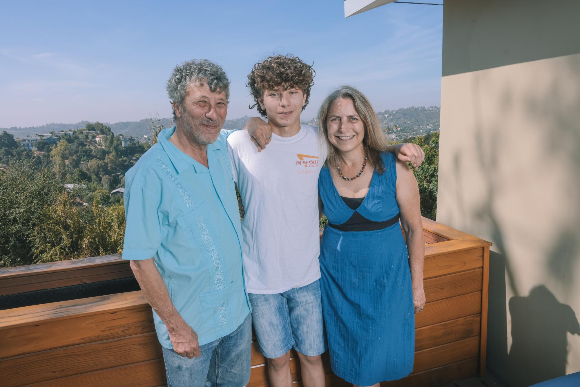  Joshua Leibner and Katherine Henninger pose for a portrait with their son Marlowe Leibner.