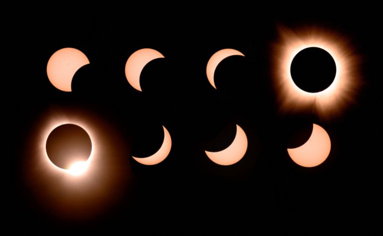 In this composite of eight photographs, the moon passes in front of the sun into totality and away again during a total eclipse in Bloomington, Indiana, on April 8, 2024